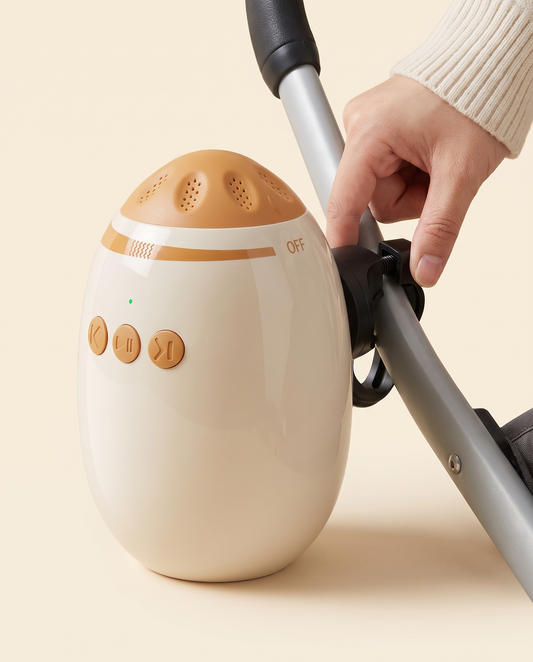 Fixation du berceur sur le tube de la poussette avec sa pince à molette