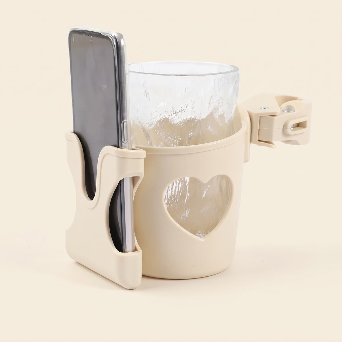 Porte-gobelet avec un téléphone dans la fente et un verre